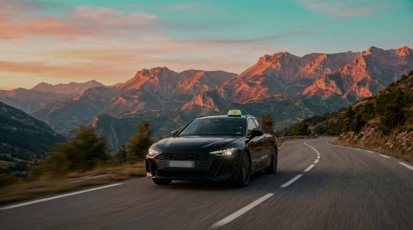 Taxi Dimitri, Audi sur une route de montagne au coucher de soleil